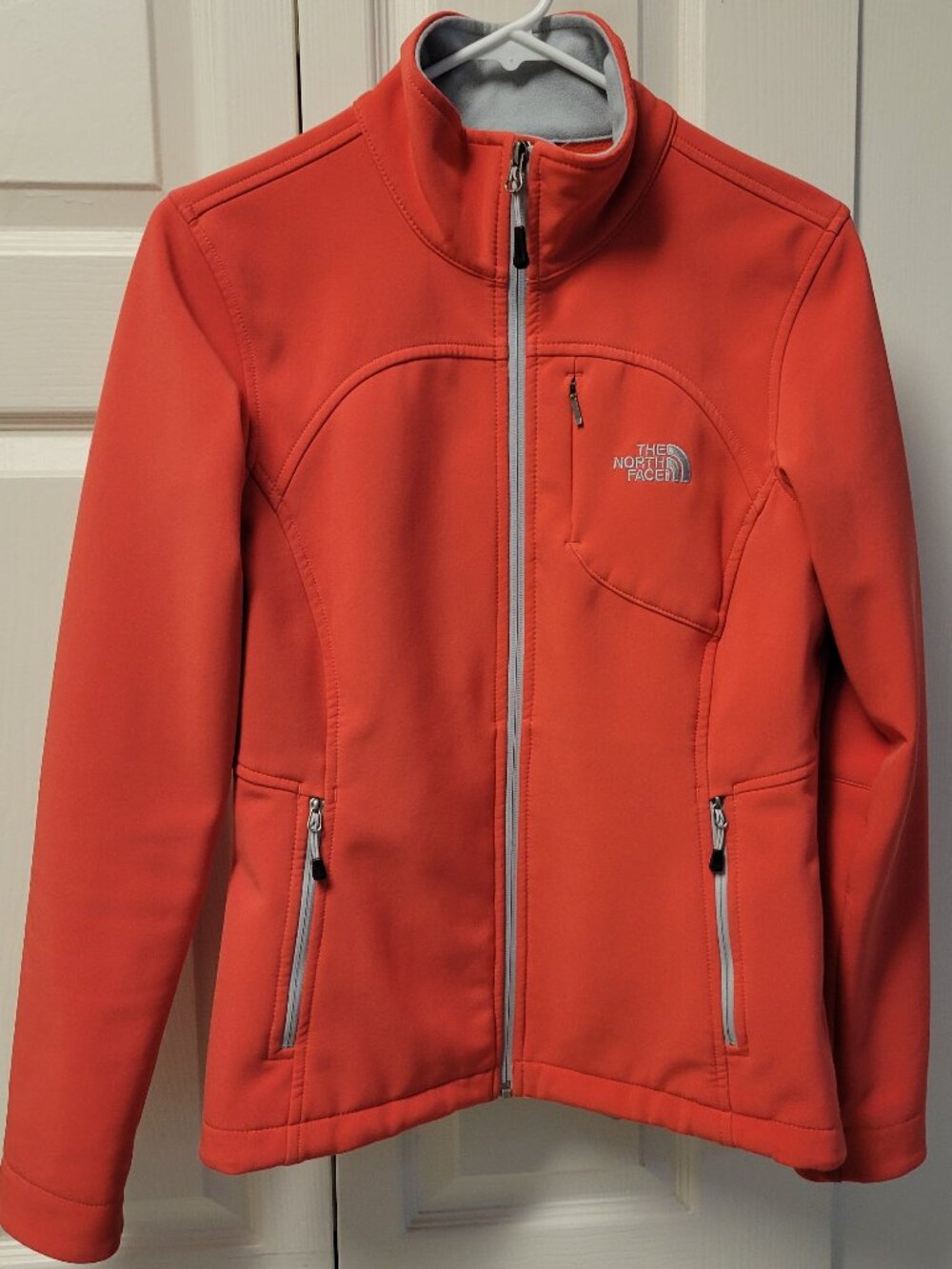 COLUMBIA Softshell  jacket  Coral color (NO RED) with gray. Size Small. Preowned